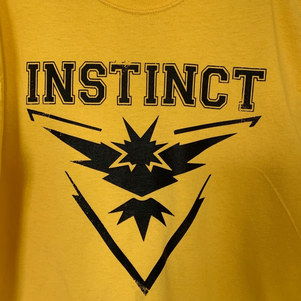Boy’s T-shirt, yellow, Size S, “Instinct”